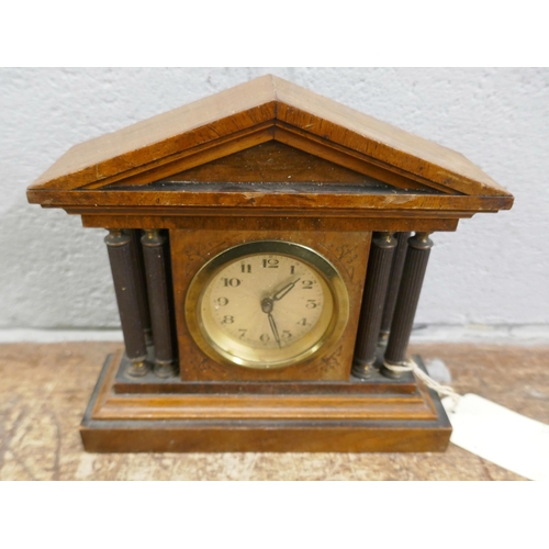 720 - An Edwardian inlaid clock, brass carriage  timepiece and two other clocks