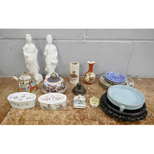 728 - A collection of oriental china including plates, scent bottles, two glazed figures, one a/f, teapot,... 