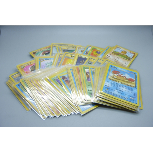 741 - Ninety vintage Pokemon cards, sets Fossil, base set, Rocket, Jungle, etc.