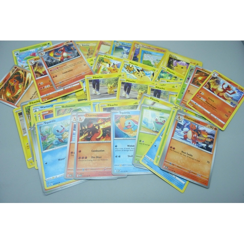 743 - Sixty Pokemon cards including vintage cards Red Cheek Pikachu, Charmander, Squirtle, etc.