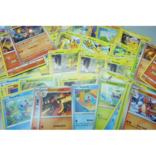 743 - Sixty Pokemon cards including vintage cards Red Cheek Pikachu, Charmander, Squirtle, etc.