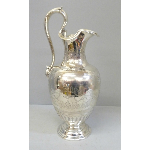 749 - A Victorian silver claret jug, London 1852, Edward & John Barnard, boxed, 772g, 31cm