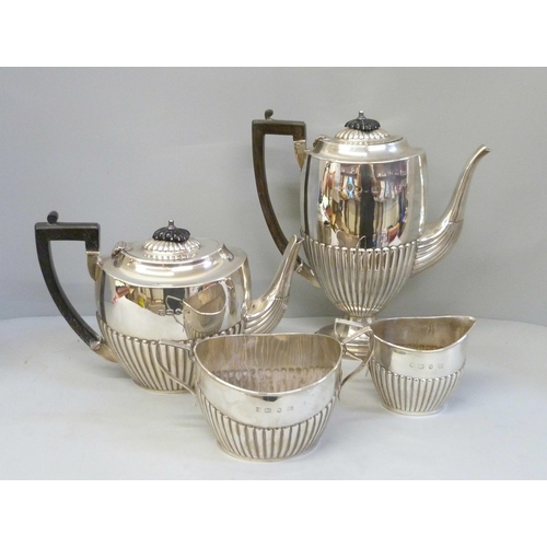 750 - A large late Victorian four piece silver tea service with coffee pot, Birmingham 1894, A & J Zimmerm... 