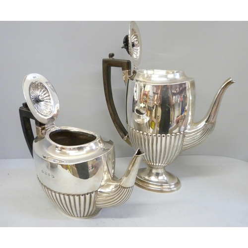 750 - A large late Victorian four piece silver tea service with coffee pot, Birmingham 1894, A & J Zimmerm... 