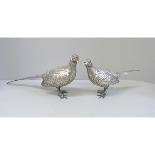 756 - A pair of silver cock and hen pheasants, London 1970, Richard Comyns, 1266g