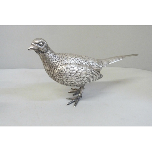 756 - A pair of silver cock and hen pheasants, London 1970, Richard Comyns, 1266g