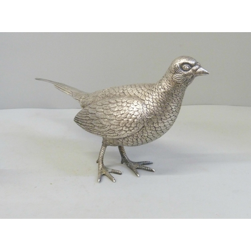 756 - A pair of silver cock and hen pheasants, London 1970, Richard Comyns, 1266g