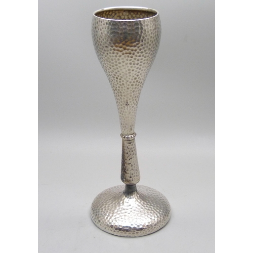 760 - An Arts and Crafts hammered effect silver vase, Chester 1902, 163mm, weighted