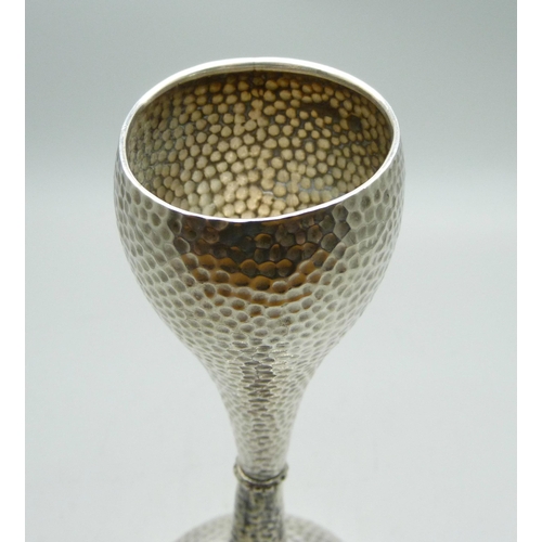 760 - An Arts and Crafts hammered effect silver vase, Chester 1902, 163mm, weighted