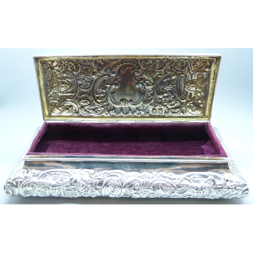 769 - A William Comyns large silver jewellery box, London 1897, 731g, 28cm wide