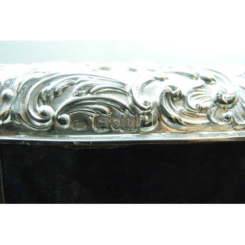 769 - A William Comyns large silver jewellery box, London 1897, 731g, 28cm wide