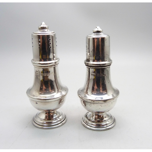 775 - A cased silver salt and pepper set, Birmingham marks, 53g