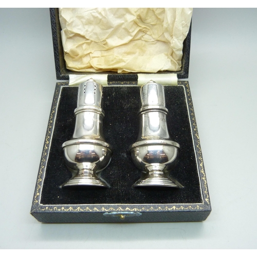 775 - A cased silver salt and pepper set, Birmingham marks, 53g