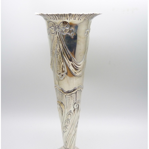 785 - A late Victorian silver vase with swag detail, London 1897, Goldsmiths and Silversmiths Co., Gibson ... 