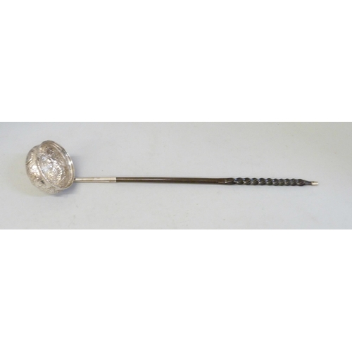 791 - A toddy ladle with baleen handle, the bowl inset with a 1720's Brazilian 400 reis gold coin