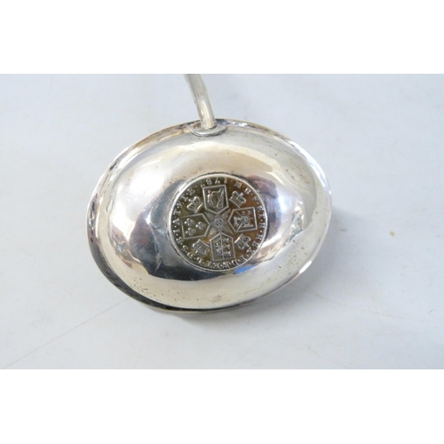 793 - A Georgian toddy ladle inset with a George III 1787 silver coin