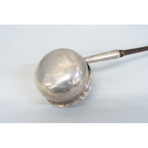 795 - A Georgian silver toddy ladle with worn London hallmark and later handle