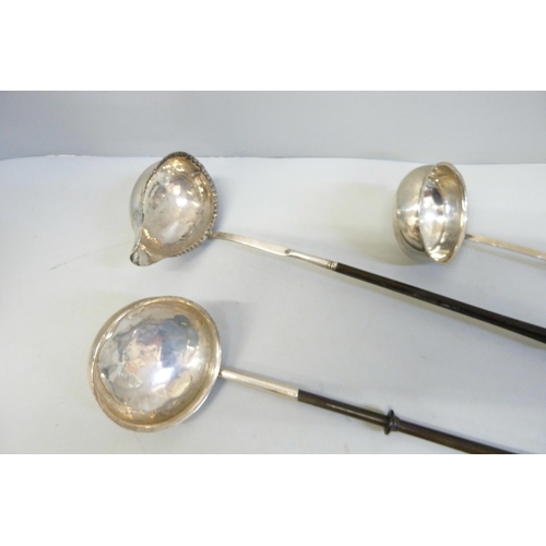 799 - Two Georgian toddy ladles, a/f, one other ladle with later handle and a ladle bowl inset with a Geor... 