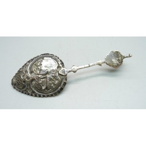 802 - A continental silver spoon, London import mark for 1892, with fish detail on the handle, 34g, 14.5cm