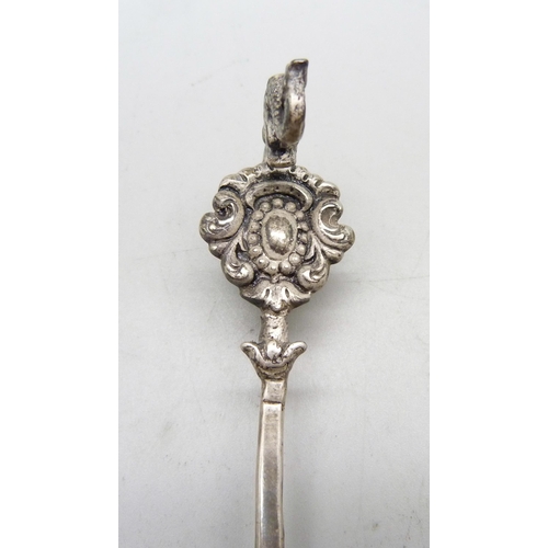 802 - A continental silver spoon, London import mark for 1892, with fish detail on the handle, 34g, 14.5cm