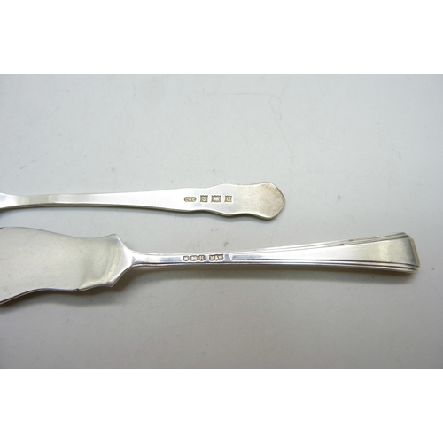 803 - A silver ring tree, a silver fork and a silver spreader, 71g