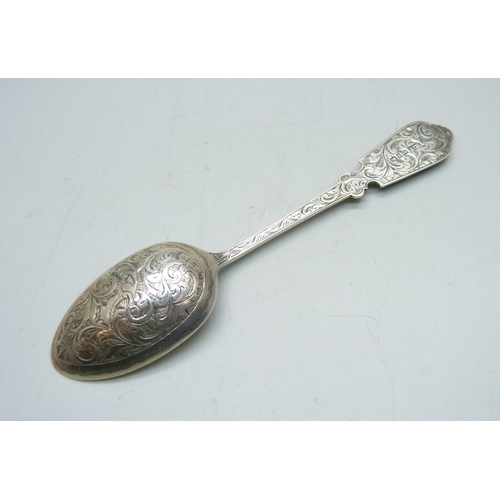 814 - A Victorian silver spoon by Hilliard & Thomason, Birmingham 1891, both sides decorated, 33g, 16.5cm