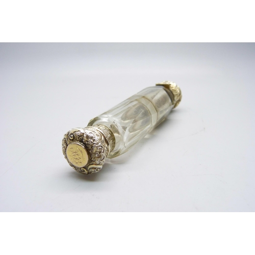 824 - A Victorian glass double scent bottle with gilt white metal tops, 12.5cm