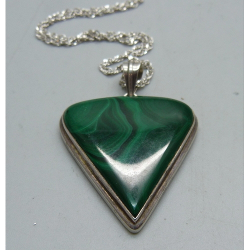 834 - A large silver and malachite pendant and chain, 30g