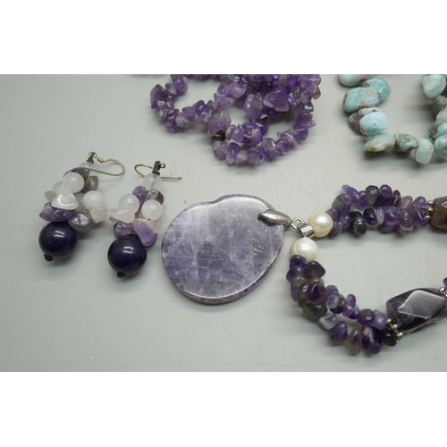 848 - A turquoise seven strand necklace with silver clasp, two amethyst necklaces, one with earrings, a mu... 