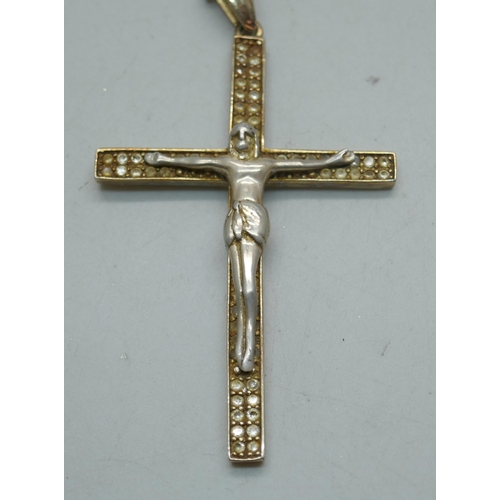 854 - A silver gilt crucifix set with cubic zirconia, on a silver chain, 14g, pendant length 7.5cm