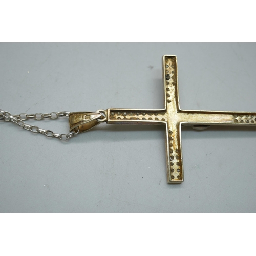 854 - A silver gilt crucifix set with cubic zirconia, on a silver chain, 14g, pendant length 7.5cm