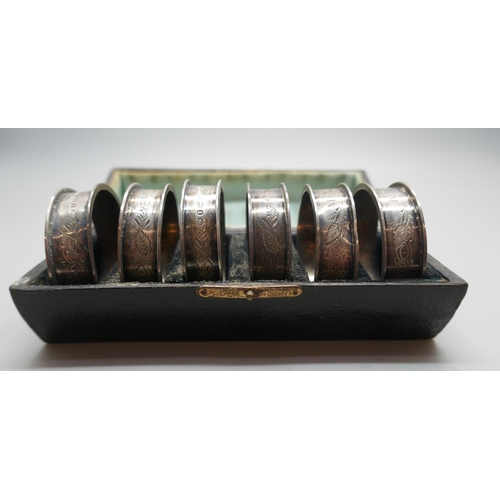 871 - A cased set of six Victorian silver napkin rings, 46g