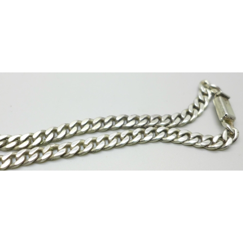 991 - A silver curb link chain necklace with a silver plated pendant, chain 50g