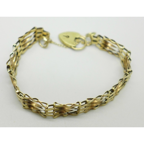 993 - A 9ct gold gate bracelet, 9.1g