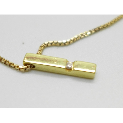 995 - An 18ct gold and diamond pendant on a 9ct gold chain, total weight 3.7g, chain 41cm