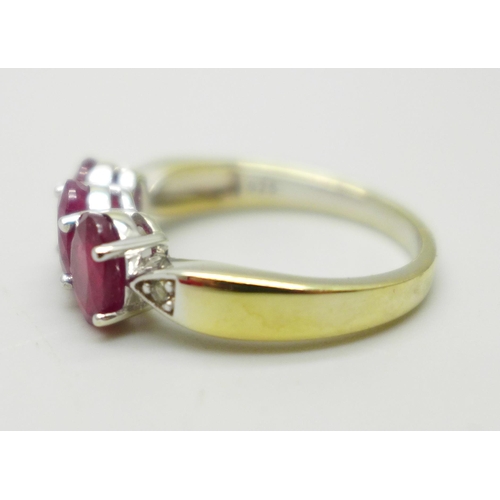 999 - A silver gilt, ruby and white stone ring, S