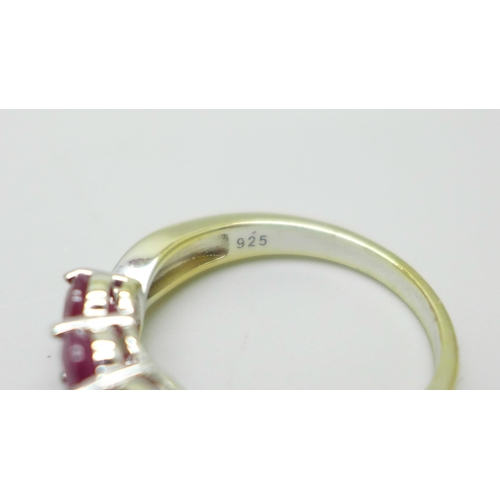 999 - A silver gilt, ruby and white stone ring, S