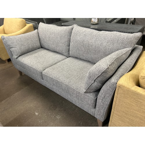 1467 - A grey weave three seater sofa