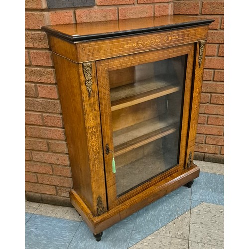 116B - A Victorian inlaid walnut and gilt metal mounted pier cabinet