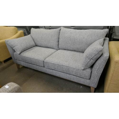 1467 - A grey weave three seater sofa