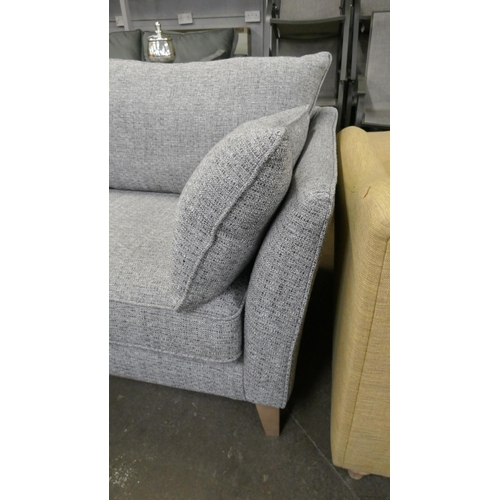 1467 - A grey weave three seater sofa