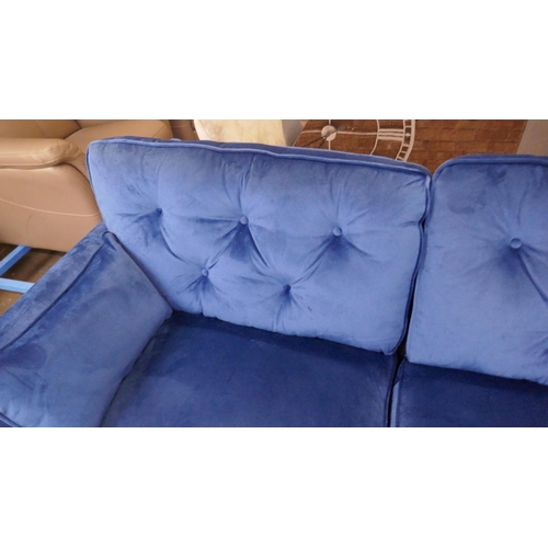 1471 - A blue velvet Hoxton three seater sofa