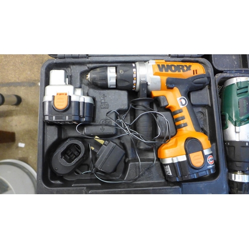 2047 - A Worx 18v hammer drill with 2 batteries and charger (WX369.3) and a Wickes 18v battery cordless dri... 