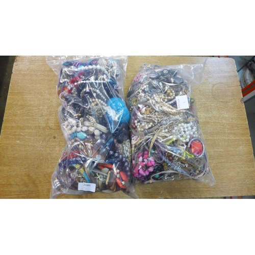 2086 - 2 Bags of costume jewellery