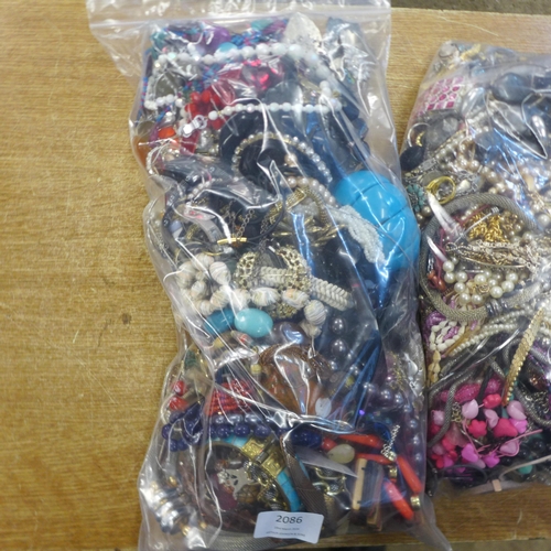 2086 - 2 Bags of costume jewellery