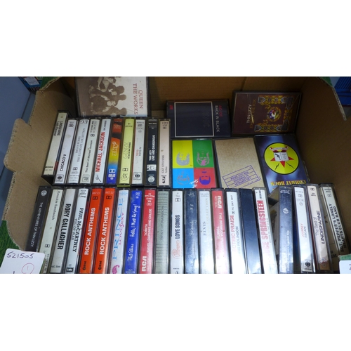 2094 - A box of approximately 30-40 tapes including mostly Rock and 3 LPs; AC-DC Who Made Who, Rolling Ston... 