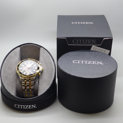 2105 - A men's Citizen Eco-drive two tone stainless steel chronograph wristwatch with bracelet strap * this... 