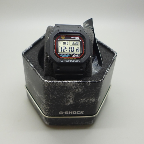 2107 - A men's Casio G-Shock digital wristwatch with solar power, LED back light and black resin strap * th... 