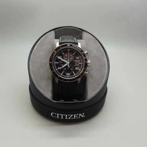 2110 - A men's Citizen Eco-Drive chronograph wristwatch with stainless steel case, black dials and black le... 