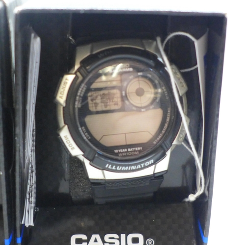 2114 - A men's Casio World Time Illuminator digital wristwatch with LCD back lit display and black resin st... 